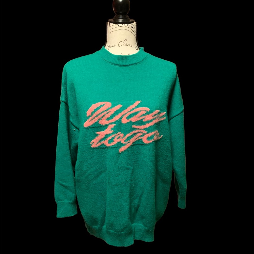 ‘Way to go’ green sweater